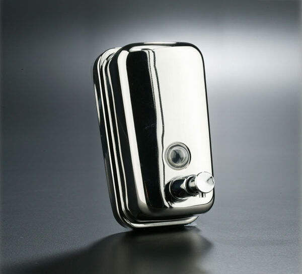 Vertical soap dispenser in bright stainless steel with 0.5L tank, manual valve, key lock, and content window for professional hygiene spaces