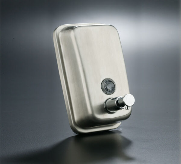Vertical soap dispenser in satin stainless steel with 0.5-liter tank, manual valve, viewing window, and key lock for professional environments.