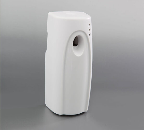 White electronic aerosol air freshener dispenser with light sensor and programmable spray timing for use in bathrooms, offices, and public areas.