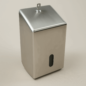 Wall-mounted satin stainless steel Z-fold toilet paper dispenser with secure top lock and controlled sheet-by-sheet dispensing.